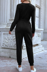 Combinaison de jogging boutonnée sur le devant avec ceinture et poches